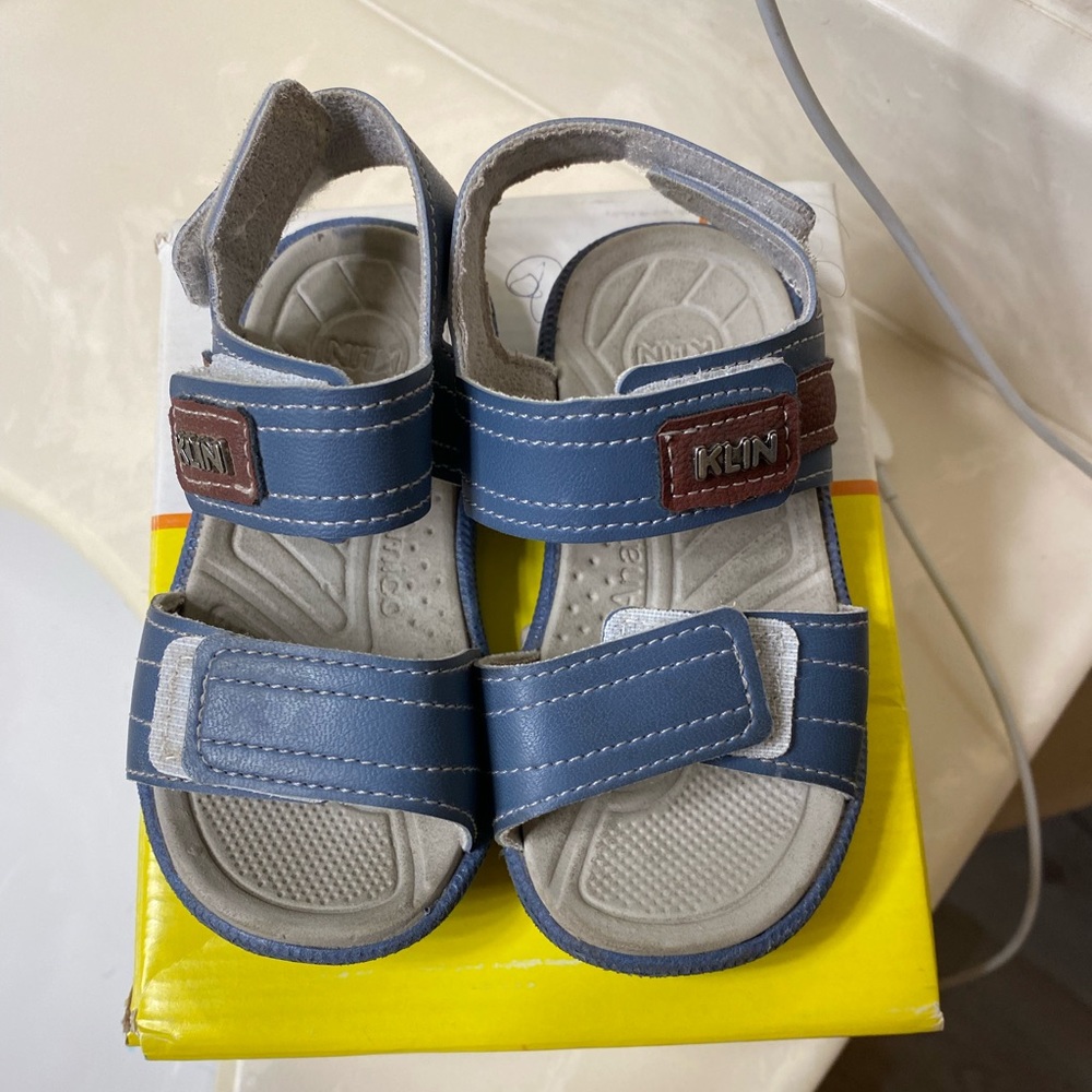 Gently used sandals for boys. Blue
